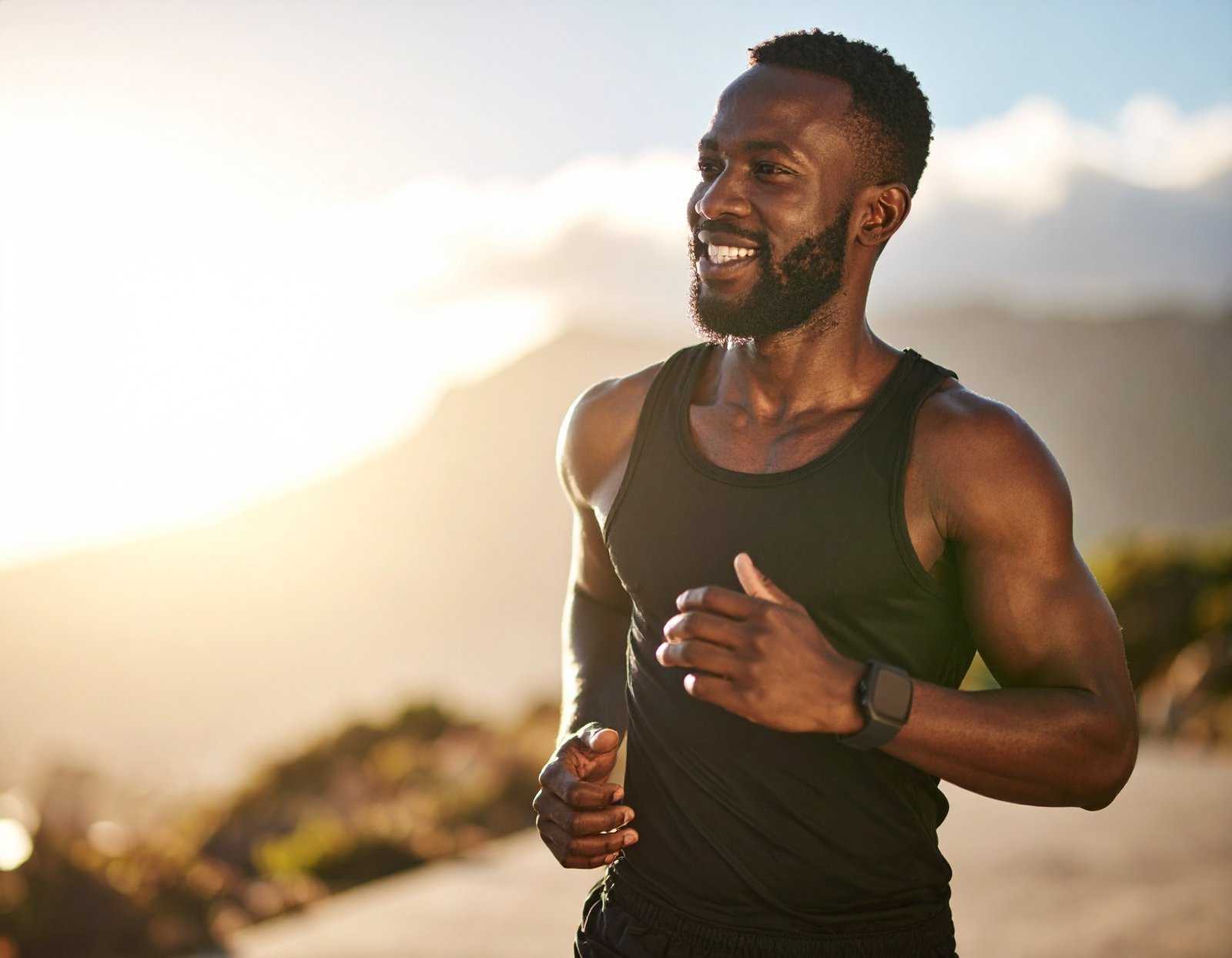 Man Running outside Smiling